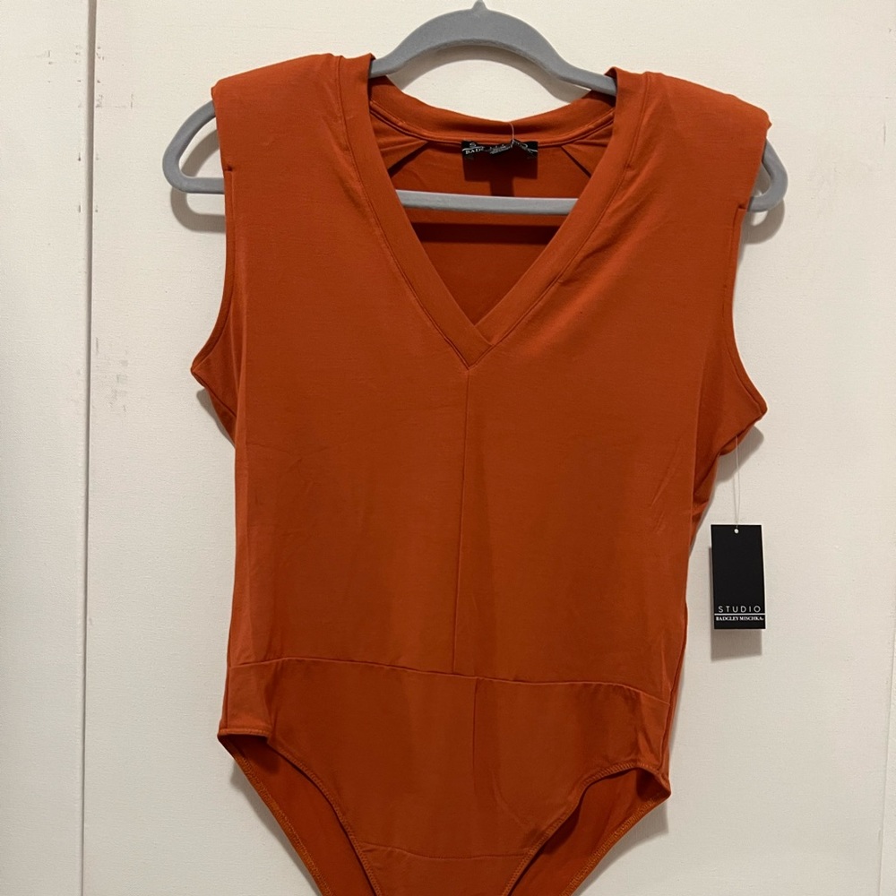 13. SP And 14. M/M Studio Badgley Mischka dark Orange bodysuit, shoulder pads